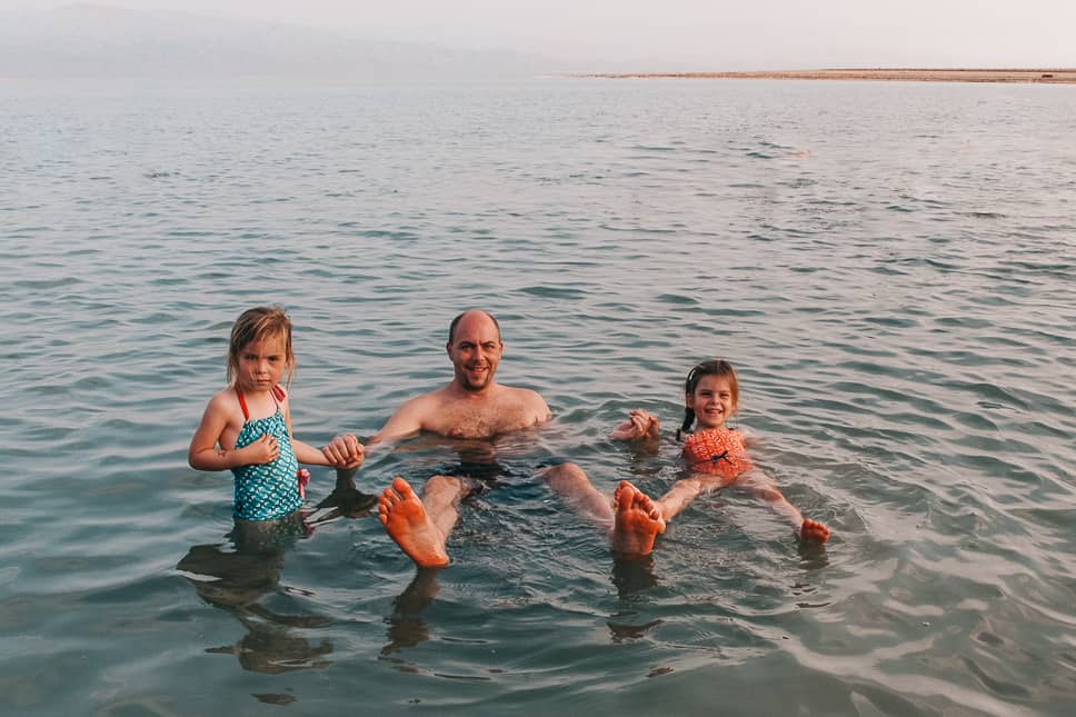Floating in the Death Sea with kids in Israel